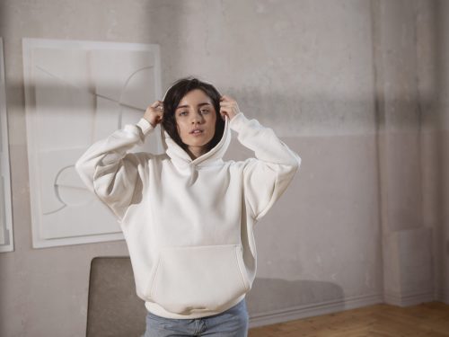 medium-shot-woman-wearing-white-hoodie